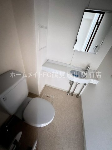 大阪市城東区今福東１丁目の賃貸マンションのトイレ