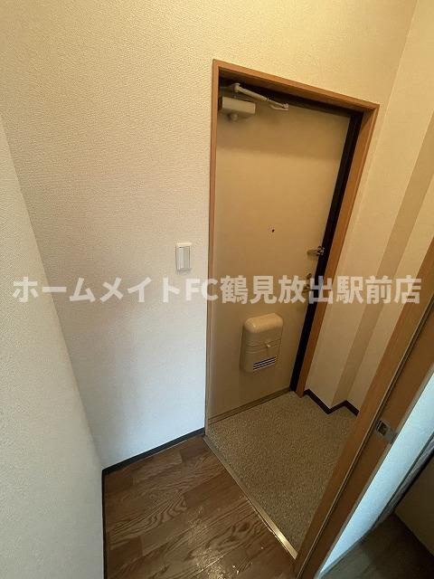 大阪市鶴見区鶴見３丁目の賃貸マンションの玄関