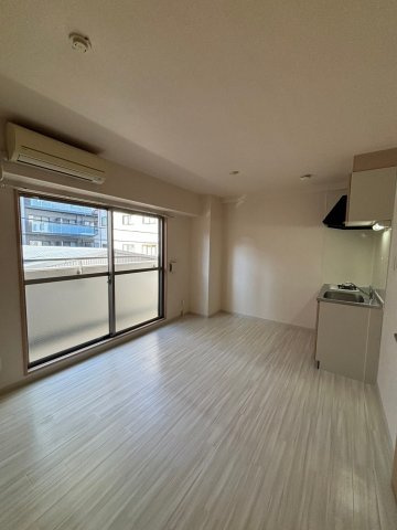 大阪市西区本田１丁目の賃貸マンションの居間・リビング