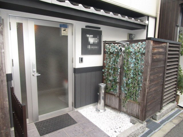 大阪市西成区玉出中１丁目の旅館の外観