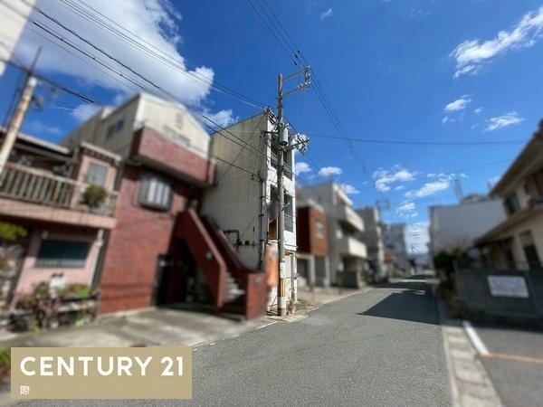 海南市名高　店舗付住宅の前面道路含む現地写真