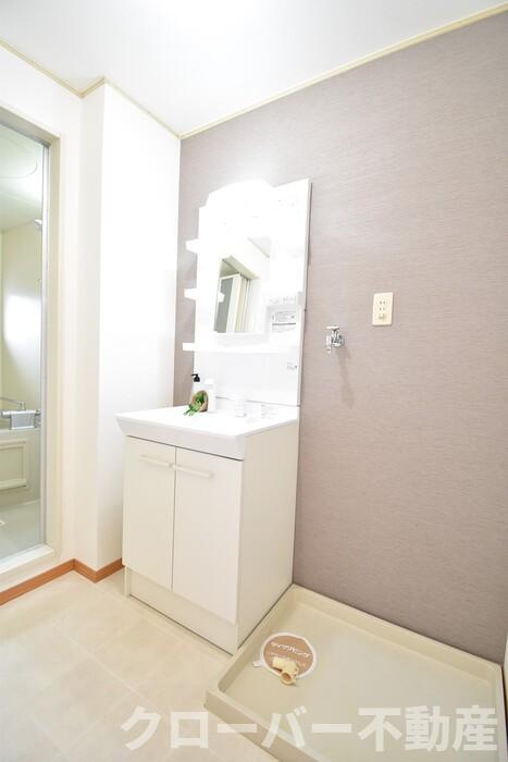 サンライズ２１ｔｈ B棟の洗面所|洗髪洗面化粧台・室内洗濯機置場