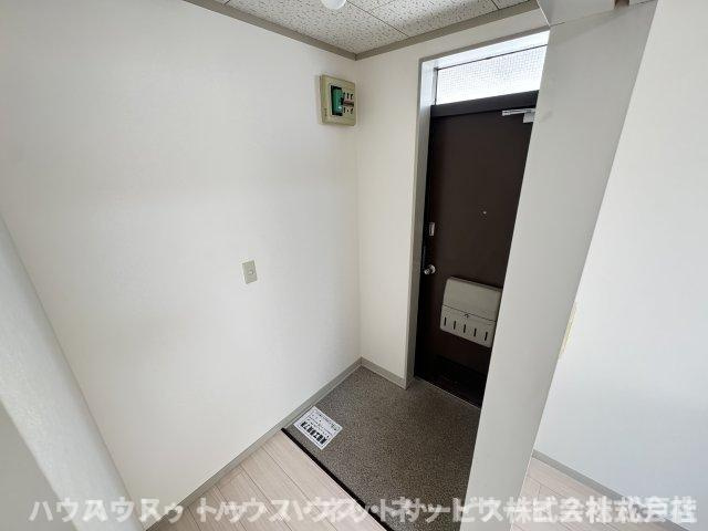 メゾンコムラ の玄関