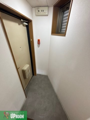 トウシュンマンションの玄関