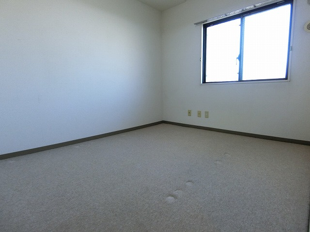 コスモ拝島の寝室