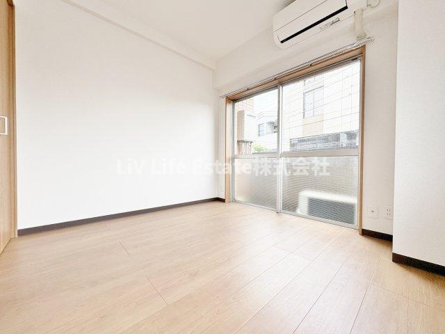 東大和ビルの寝室