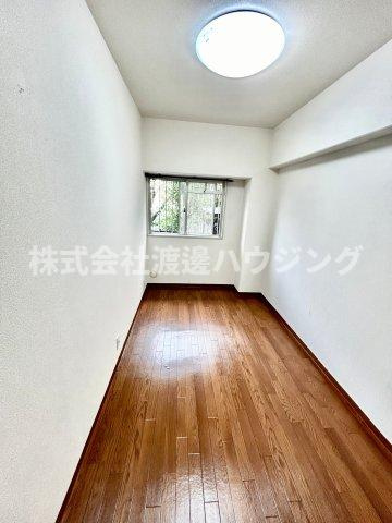 メゾン千里丘G棟の洋室