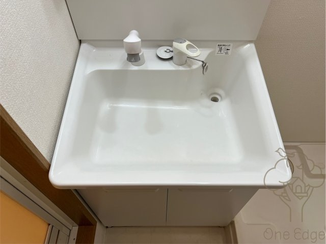 クイーンズコート天満の洗面所