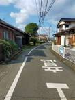 売土地の前面道路含む現地写真