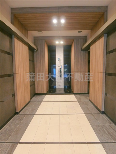 コンフォリア蒲田のエントランス|防犯カメラ　TVモニター付オートロック