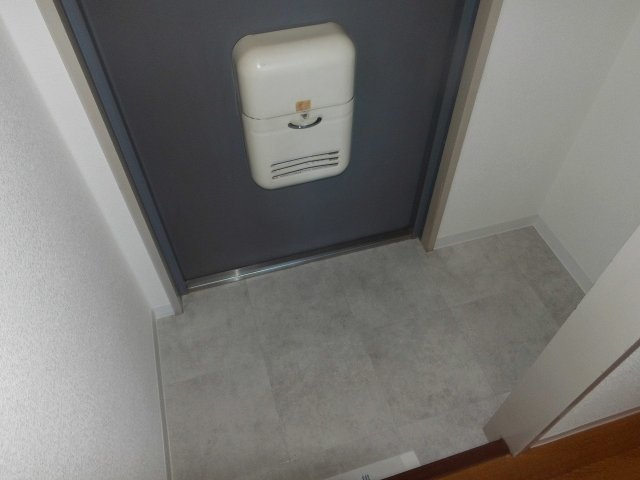 クローバーズマンションの玄関