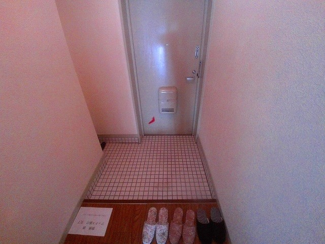 プレジオ王塚台の玄関