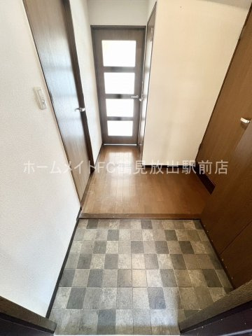 大阪市城東区放出西２丁目の賃貸マンションの玄関
