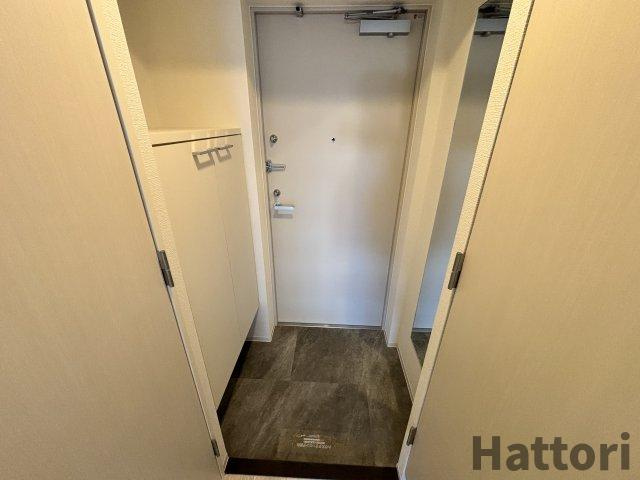 アドバンス江坂ラシュレの玄関