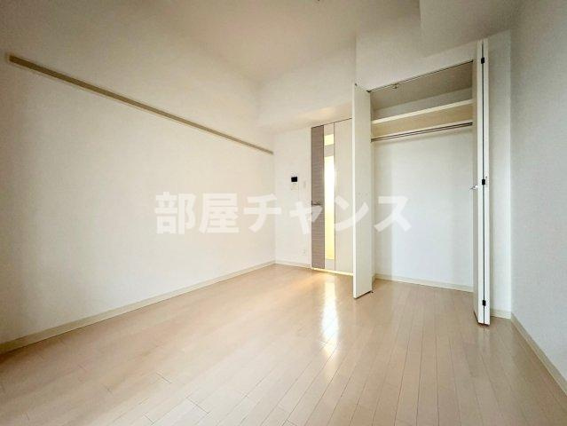 プレサンス泉アーバンゲートの寝室