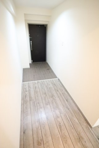 大阪市城東区今福東１丁目の賃貸マンションの玄関