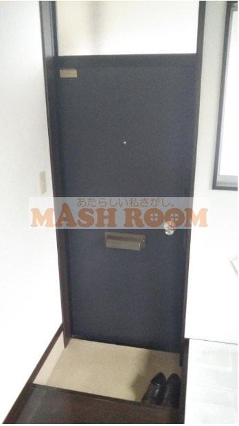 中野区大和町４丁目のアパートの玄関
