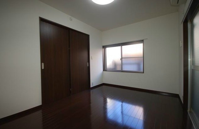 中野区大和町４丁目のアパートの寝室