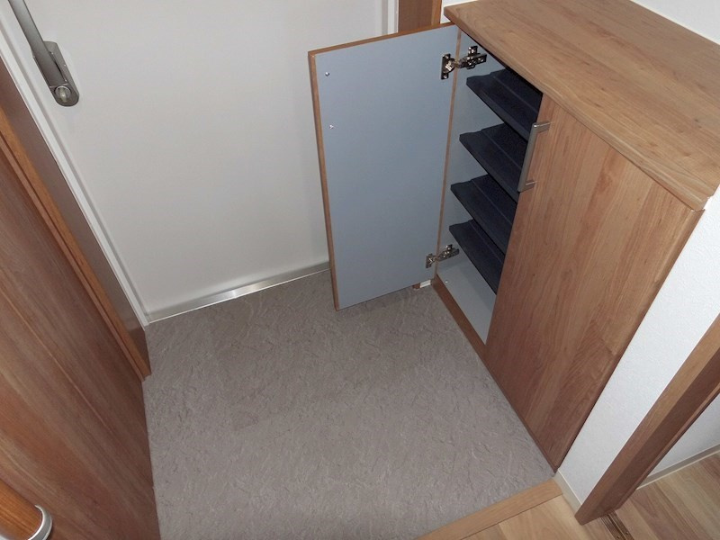 メゾンアカシの玄関