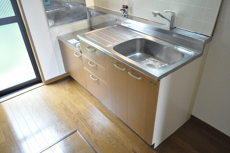 パセオ大住　車庫付きのキッチン