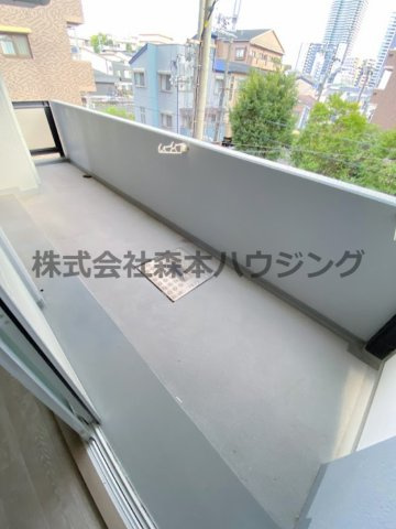 【バルコニー】 | 　グランドヴィラ香里 | 暖かな日差しのふりそそぐバルコニー