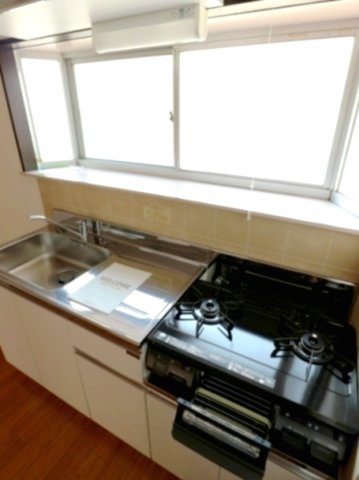 ガーデンハイツ桜台Aのキッチン|※別号室参考写真です
