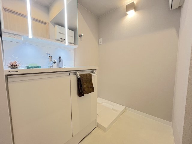 三愛シティライフ箱崎12の洗面所