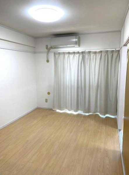 ロイヤルプラザヤマダの寝室