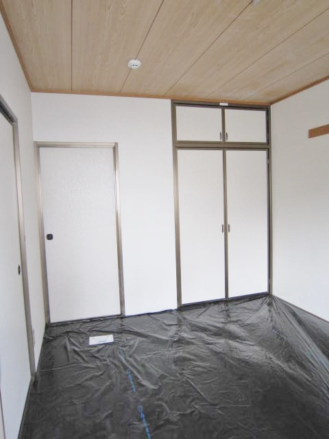 プラザ朝霧の寝室