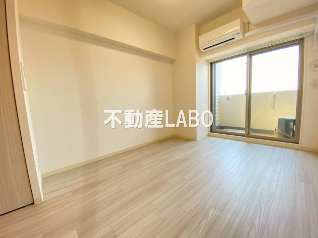 プレサンスOSAKA DOMECITY クロスティの寝室