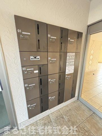 プレッソ城ヶ崎壱番館の玄関