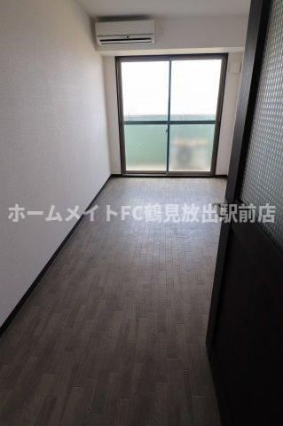 東大阪市高井田本通７丁目の賃貸マンションの洋室