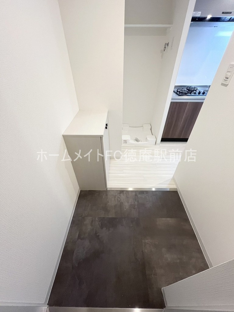 大阪市城東区東中浜１丁目の賃貸マンションの玄関