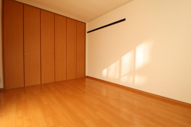 プレジール千里の洋室