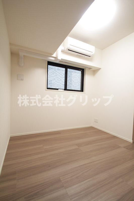 ディームス横濱青木町の洋室
