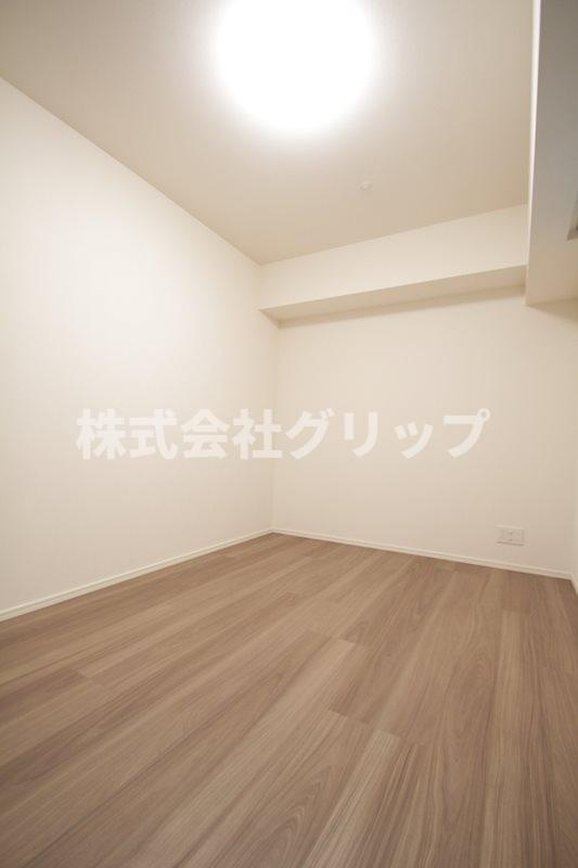 ディームス横濱青木町の洋室