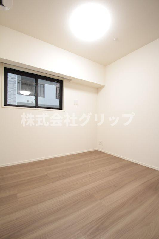 ディームス横濱青木町の洋室