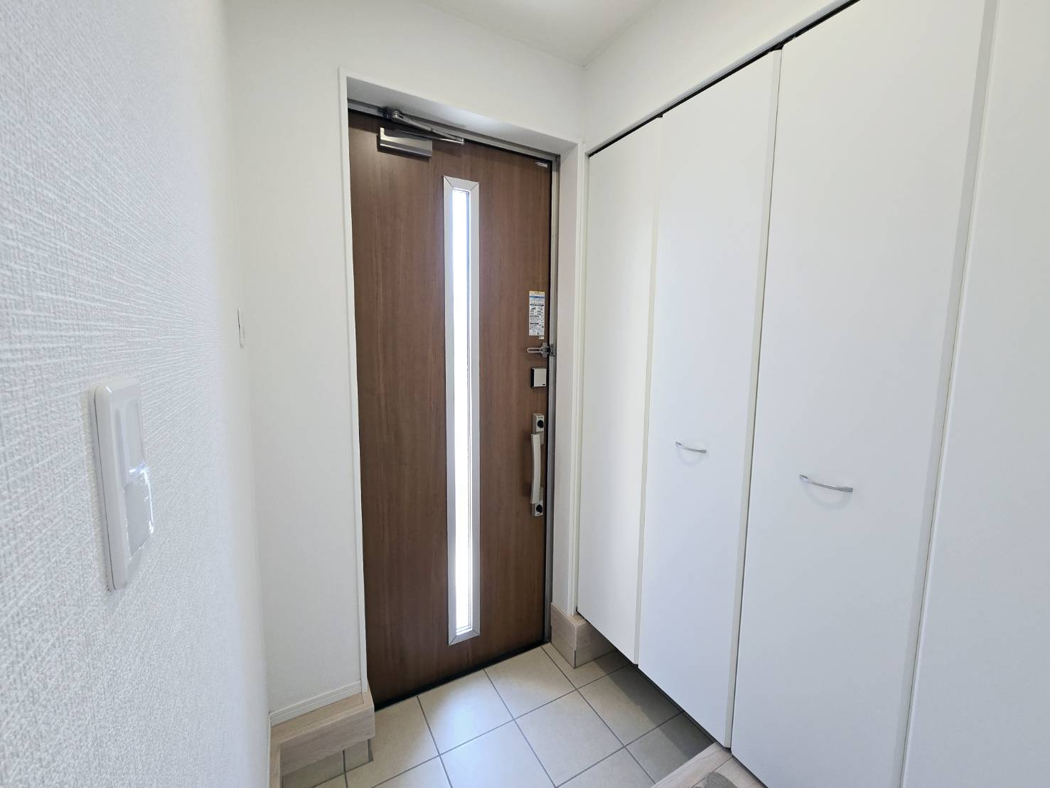 クレイドルガーデン八戸市南類家　第3　2号棟の玄関