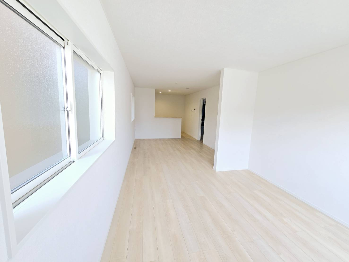 クレイドルガーデン八戸市南類家　第3　3号棟の居間・リビング