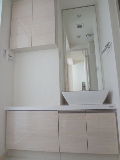 朝日マンションの洗面所|使いやすい広さの洗面化粧台