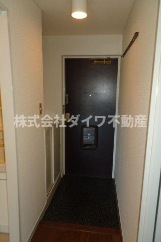 ツトムマンションの玄関