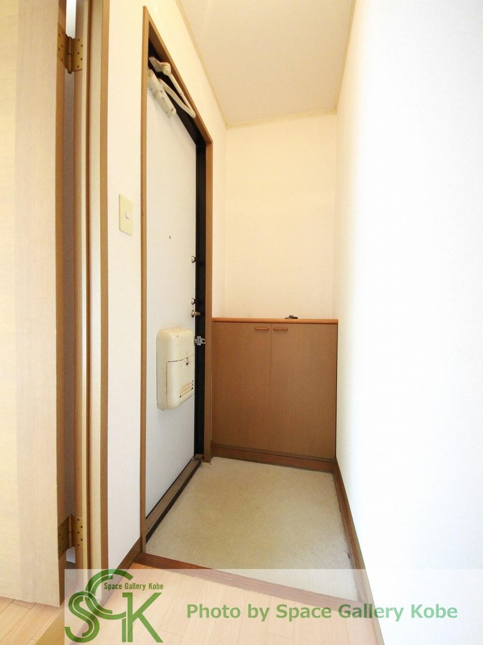 ハイカムール伊川の玄関