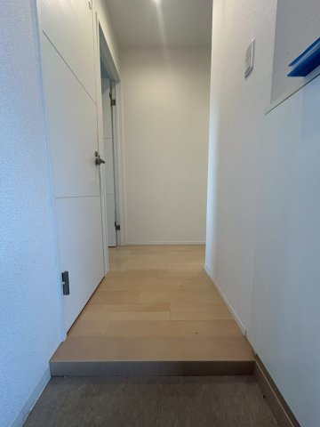 マンションKUROSEの玄関