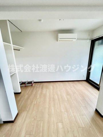 ロイヤルコート千里山の寝室