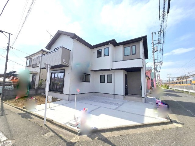 羽村市羽加美1丁目　全１棟の前面道路含む現地写真