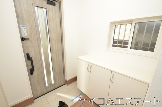 新築住宅　プラザコート永犬丸南町3丁目の玄関