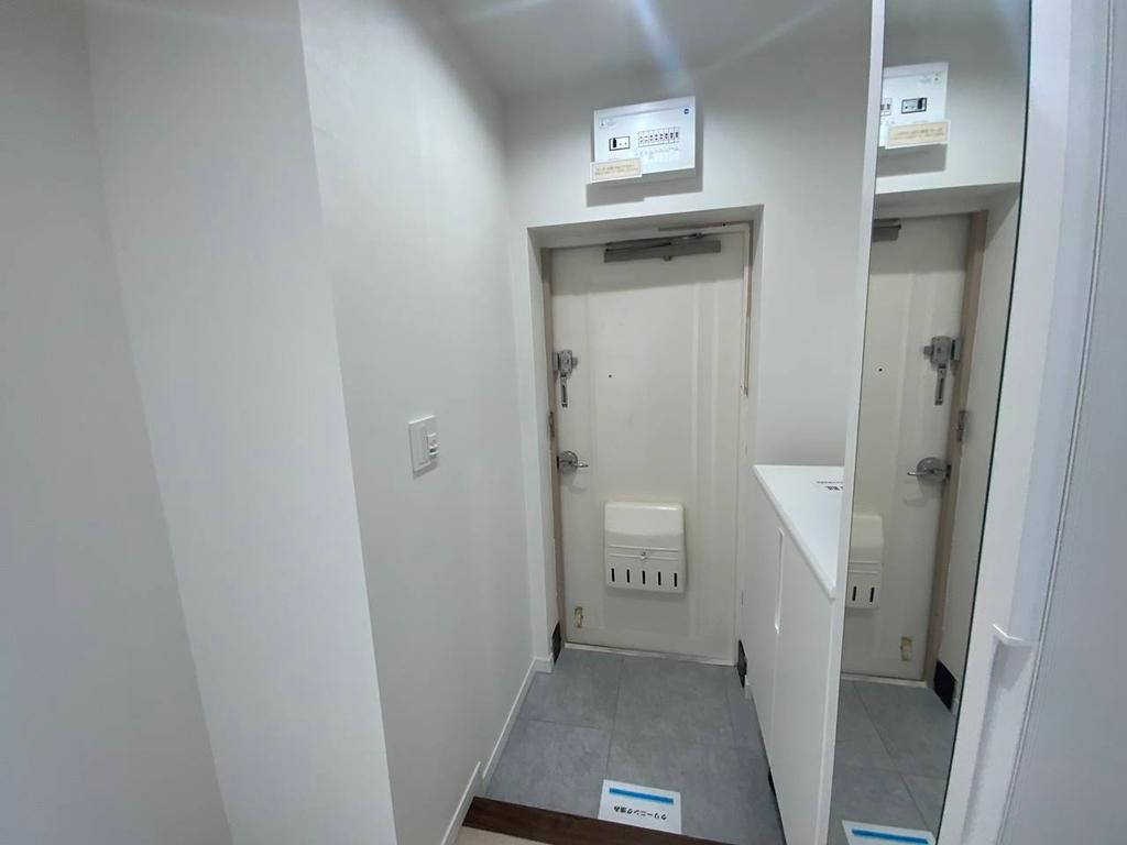 立川市羽衣町２丁目の中古マンションの玄関