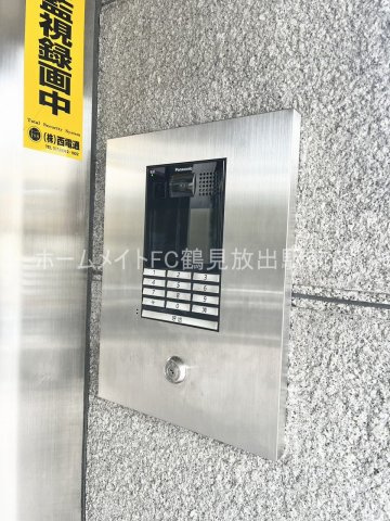 大阪市鶴見区緑２丁目の賃貸マンションのエントランス