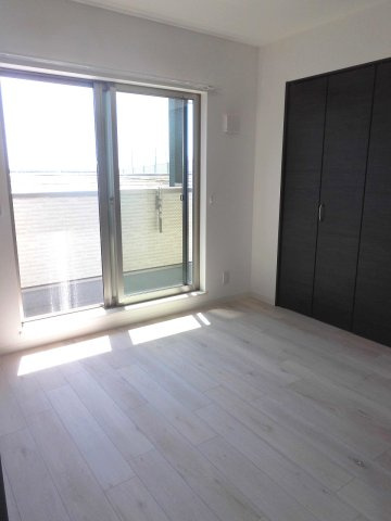 ジーメゾン明石魚住1の洋室