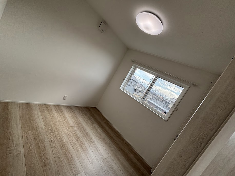 クラハ酒津Ⅲ1号地の洋室